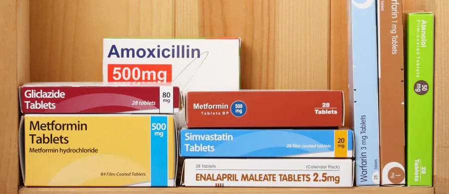 Various prescription drug boxes symbolizing commonly abused medications, illustrating warning signs like dependence, doctor shopping, and misuse.